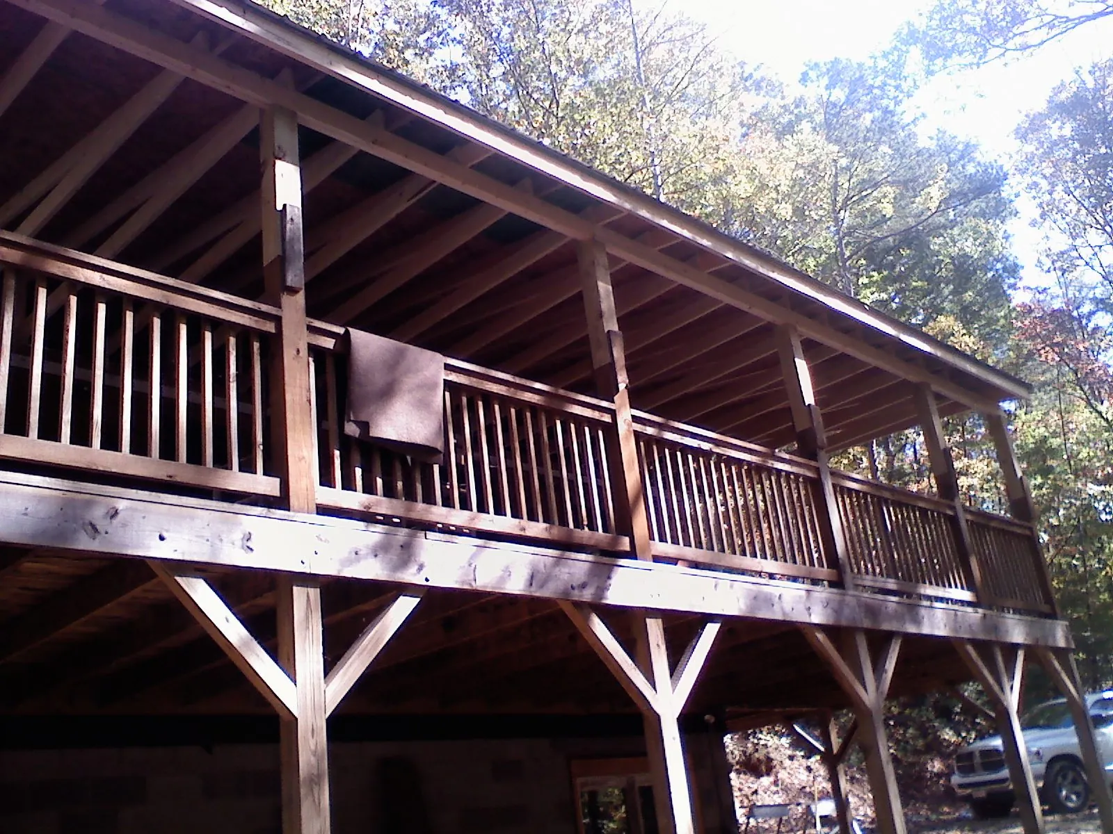 Timber framing under a new elevated porch and deck — Roof Leak Repair in Roans Prairie by Roofing Brothers